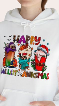 a woman wearing a white hoodie with an image of santa and other characters on it