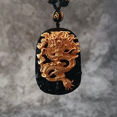 Unleash the Fury of the Dragon! Kings of the spirit world, dragons fear nothing. In Eastern culture, the Yellow Dragon 黃龍 is the fifth element of Earth and the God at the center of the Cosmos Are you ready to release the dragon? ☯ 18K Carved Gold Dragon ☯ Black Onyx Beaded Necklace ☯ Black Onyx Pendant God At The Center, Japanese Accessories, Fear Nothing, Beaded Necklace Black, Dragon Black, Eastern Culture, Yellow Dragon, Golden Dragon, Anime Fashion