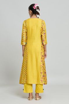 Yellow kurta with pintuck details and floral pattern. Paired with a matching pant. - Aza Fashions Festive Cotton Kurta With Pintucks, Eid Straight Kurta With Pintucks, Eid Pintucks Straight Kurta, Straight Kurta Sets With Printed Motifs For Work, Straight Kurta With Printed Motifs For Work, Traditional Pant Set With Floral Print And Straight Kurta, Workwear Sets With Printed Motifs And Straight Kurta, Traditional Sets With Pintucks For Eid, Traditional Eid Sets With Pintucks