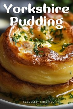 yorkshire pudding on a white plate with the words yorkshire pudding overlaying it's image