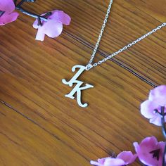 Express your style and personality in the most elegant way with our personalized initial necklaces. Carry their initials close to your heart with this beautifully crafted piece. Made from high quality materials, this necklace is perfect for both daily use and special occasions. This special gift will be a unique gift for your mother, wife, or sister.  Make her happy on special occasions like Birthday, Aniversary, Mother's Day, or Christmas! You can easily contact us with your questions. We will Elegant Silver Initial Necklace For Personalized Gift, Elegant Monogram Name Necklace For Valentine's Day, Personalized Elegant Initial Necklace For Birthday, Customized Elegant Initial Necklace For Anniversary, Silver Name Necklace For Anniversary, Elegant Monogram Initial Necklace For Valentine's Day, Silver Name Necklace For Anniversary Gift, Rose Gold Sterling Silver Initials Charm Necklace, Initial Pendant Charm Necklace For Anniversary