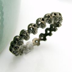 Hey, I found this really awesome Etsy listing at https://www.etsy.com/listing/126874455/black-small-skull-eternity-ring Interesting Wedding Rings, Alternative Wedding Ring, Gothic Wedding Rings, Skull Wedding Ring, Gothic Engagement Ring, Alternative Wedding Rings, Skull Wedding, Black Gold Ring, Small Skull