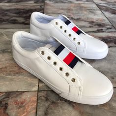 Tommy Hilfiger Anni Slip On Sneakers No Laces Elastic Band On Tongue White With Classic Red, White, And Blue Stripes Size 10 New Without Box. Never Worn! Comes From A Clean, Smoke-Free Home Trendy White Slip-on Sneakers With Round Toe, White Flat Heel Slip-on Sneakers, White Leather Flat Slip-on Sneakers, Trendy White Slip-ons With Flat Heel, Tommy Hilfiger Sneakers For Spring, White Synthetic Slip-on Sneakers With Flat Heel, White Synthetic Flat Heel Slip-on Sneakers, White Flat Leather Slip-on Sneakers, White Casual Tommy Hilfiger Sneakers