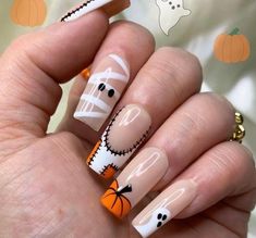 We rounded up the best halloween nail designs that are trending, from French manicures to textured nails to chrome finishes and more. Mummy French Tip Nails, Patch Work Nail Art, Medium Square Halloween Nails, Halloween French Tip Nails Square, Patch Nail Art, Halloween Nails Pumpkin Design, Ghost And Pumpkin Nails, Mummy Halloween Nails, Pumpkin And Ghost Nails