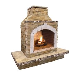 an outdoor fireplace with a fire in it