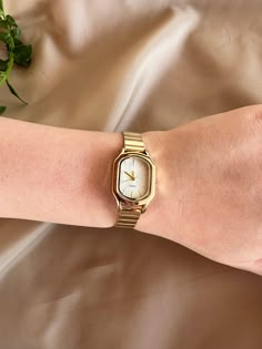 Discover the perfect blend of sophistication and charm with our dainty gold watch, a stunning addition to any woman's collection. With a case diameter of 20-24mm, this small gold watch is delicately designed to complement any outfit, whether it's for a special occasion or an everyday look. This dainty antique watch captures the essence of vintage elegance, showcasing exquisite craftsmanship that highlights its gold vintage watch finish. The gentle shimmer of the gold watch adds a touch of luxury, making it an ideal choice for the modern woman who appreciates timeless beauty. Embrace the allure of vintage watches with this captivating piece, perfect for those who adore womens watches gold. Its refined design ensures it stands out while remaining versatile enough for any occasion. Whether yo Rectangle Womens Watch, Luxury Vintage Collectible Watch Accessories, Mixed Metal Watch, Vintage Gold Watch Women, Ladies Watches Classy Elegant, Dainty Silver Watch, Dainty Watches, Small Gold Watch, Dainty Gold Watch