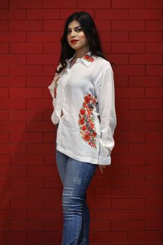 A stunningly marvellous Top. This Shirt Top features Multi-Colour Kashmiri Aari embroidery on Collar and shirt Pocket.- - - - - - - - - - - - - - - - - - - - Product Details- Condition: Brand New (made to order)- Brand: Glancia by Angad Creations- Style: Shirt Top- Fabric: Monga Cotton- Base Colour: White- Embroidery: Kashmiri Thread Embroidery- Embroidery Colour: Multi-Color- Standard Length: 27" (69 cm) approx. | Can be Customized - Care Instructions: Dry Clean Only**If you want the top to be Women Tunic, Hippie Top, White Cotton Shirt, Pashmina Wrap, Embroidered Shirts, Shirt Pocket, Hippie Tops, Aari Embroidery, Bohemian Women