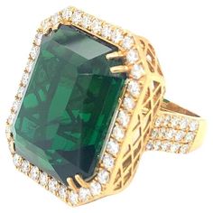 56.86 Carat Natural Green Tourmaline with Halo diamond set in 18 Kt Yellow gold. Emerald Jewelry, Diamond Set, Gem Stone, Green Tourmaline, Animal Jewelry, Cocktail Rings, Halo Diamond, Tourmaline, Halo