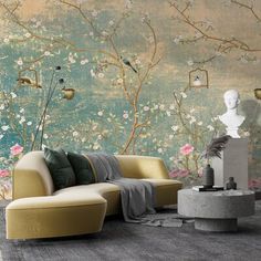 a living room scene with focus on the couch and wallpapered area that is decorated in pastel tones