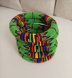 Bracelets | Custom Bracelets | Mother's Gift | Gift Idea | Bangles | Unique Gift | Bracelets For Women | Yoga Bracelets | Daughters Gift These superbly crafted Zulu beaded bracelets are made of fine beads which can be worn in any occasion. Available in different colors.    The price is for 1 piece/bracelet.   For more beaded bracelets ,please click below link: https://www.etsy.com/shop/NanacraftsKE?ref=shop-header-name&listing_id=775922675&from_page=listing&section_id=23600491 Feel free to send Handmade Green Braided Bracelets With Round Beads, Traditional Green Bracelets With Round Beads, Traditional Green Round Bead Bracelets, Traditional Adjustable Green Cuff Bracelet, Traditional Green Adjustable Cuff Bracelet, Green Beaded Bracelets With Large Beads As Gift, Green Bangle Bracelets With Colorful Beads, Green Hand-strung Braided Bracelet With Round Beads, Green Stretch Bangle Bracelet With Colorful Beads