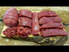 raw meat is on a cutting board ready to be cooked