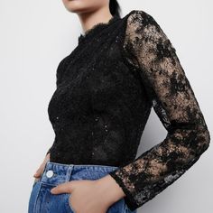 Nwt Zara Lace Sequin Blouse Size L Color: Black Long Sleeve Blouse With A High Neck. Sequin Appliqu Detail. Buttoned Opening At The Back. Zipper On The Side. Outer Shell 66% Polyester 16% Cotton 10% Polyamide 8% Viscose Lining 100% Polyester From Armpit To Armpit - 19” Length - 26” Waist Flat - 16” Sheer Sleeves Lace Top For Party, Fitted Mesh Top With Lace Detail For Party, Lace Top For Party In Fall, Lace Top With Sheer Sleeves For Party, Fitted Mesh Top With Lace For Party, Fitted Lace Mesh Top For Party, Long Sleeve Lace Top With Sheer Sleeves For Party, Party Lace Top With Sheer Long Sleeves, Stretch Lace Mesh Top For Party