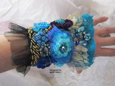 Handmade Bohemian Cuff Bracelet For Wedding, Bohemian Embroidered Bracelets For Weddings, Handmade Cuff Bracelet For Wedding, Handmade Wedding Cuff Bracelet, Bohemian Blue Cuff Bracelet For Party, Elegant Embroidered Bracelets As A Gift, Elegant Embroidered Bracelets As Gift, Handmade Wearable Art Cuff Bracelet For Party, Bohemian Blue Cuff Bracelet