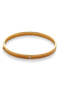 A single bright-cut diamond sparkles on a sleek bangle bracelet crafted from recycled sterling silver or 18-karat gold vermeil for elegant style. Exclusive US retailer 6 1/2" inner circumference; 1/4" width Hinge closure Total diamond weight: 0.016ct. Color: H/I Clarity: I1 Recycled sterling silver/18k-gold plate/diamond Imported >Diamond Guide Recipient of the Butterfly Mark certification, which identifies luxury brands that adhere to social and environmental best practices This brand meets Nor Timeless Formal Bangle With Single Diamond, Classic Diamond Jewelry With Shiny Finish, Luxury Diamond Bangle Bracelet With Single Diamond, Luxury Single Diamond Bangle Bracelet, Timeless Single Diamond Bangle Bracelet, Luxury Bangle With Single Diamond, Polished Diamond Bangle Bracelet, Diamond Bangle In Polished Yellow Gold, Classic White Gold Bangle With Single Diamond