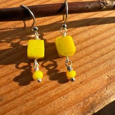 Dainty And Bright Yellow Glass Square Shaped Bead With Stainless Steel Silver Color Ear Wire. Made For Sensitive Ears. Measurements: Over All Length With Ear Wire: 1.25 Inches Ear Wire: .5 Inch Drop: .75 Inch These Are Made To Order And Color, Size, Finishes And Shapes May Vary Slightly From Photos. Beaded Dangles, Sensitive Ears, Ear Wire, Bright Yellow, Glass Bead, Halloween Shopping, Silver Color, Square Glass, Jewelry Earrings Dangle