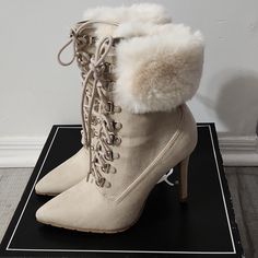 A Never Been Worn Pair Of Qupid Lace Up Boots With Faux Fur Cuff. The Heel Is About 4 Inches, Will Include Box With Purchase. Cream High Heel Winter Boots, Cream High Ankle Heels For Winter, Beige Lace-up Heels For Winter, Winter Beige Lace-up Heels, Cream Chic Heels For Winter, Chic Cream Heels For Winter, Beige Ankle Boot Heels For Winter, Casual Cream Heels For Winter, Chic Lace-up Winter Heels