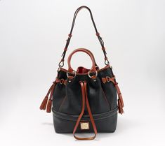 Choices, choices. This Dooney & Bourke pebble leather bag lets you decide -- on your shoulder, over your arm, or in your hand? Pull the drawstring tight or leave it loose? Take it to work or a weekend getaway? That question's easy -- both! From Dooney & Bourke. Hobo Handbags, Weekend Getaway, Dooney Bourke, Fashion Handbags, Pebbled Leather, Drawstring Bag, To Work, Leather Bag, Handbags