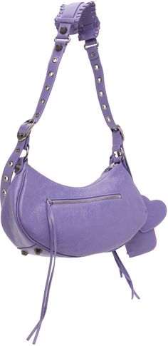 Crinkled Arena lambskin shoulder bag in purple. Studs, pin-buckle straps, and gathering at face. · Pin-buckle shoulder strap · Detachable zip pouch at shoulder strap · Detachable mirror · Zip pocket at face and back face · Bumper studs at base · Zip closure · Zip pocket at interior · Cotton canvas lining · Antiqued silver-tone hardware · H6 x W13 x D3.5 in Supplier color: Mauve Purple Baguette Shoulder Bag, Purple Leather Shoulder Bag With Adjustable Strap, Purple Shoulder Bag With Adjustable Strap For Evening, Purple Evening Shoulder Bag With Adjustable Strap, Luxury Purple Shoulder Bag With Adjustable Strap, Purple Shoulder Bag With Silver-tone Hardware For Evening, Zip Pouch, 6 Inches, Antique Silver