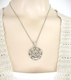 Pentacle With Phases of the Moon Necklace - woot & hammy Mystical Silver Pendant Jewelry, Mystical Silver Star-shaped Jewelry, Mystical Silver Star Jewelry, Silver Moon-shaped Locket Jewelry, Silver Moon Phase Medallion Jewelry, Silver Medallion Jewelry With Moon Phase, Mystical Engraved Silver Jewelry, Mystical Silver Round Jewelry, Mystical Round Silver Jewelry