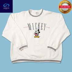 Vintage Mickey Mouse Sweater Large Mickey x Alwaysky. Introducing our timeless sweater, perfect for any occasion. Crafted from premium quality materials, this sweater offers both style and comfort. Its classic design features a crew neckline, ribbed cuffs, and hem, providing a sleek and polished look. Available in a variety of colors and sizes, it suits every individual's taste and body type. Whether you're dressing up for a formal event or keeping it casual for a weekend outing, this versatile Retro White Sweatshirt For Winter, Retro White Winter Sweatshirt, White Retro Winter Sweatshirt, Retro White Crew Neck Sweater, Retro White Sweatshirt With Ribbed Cuffs, Classic White Crew Neck Sweatshirt, Vintage White Sweater With Ribbed Cuffs, Retro White Crew Neck Sweatshirt, White Retro Crew Neck Sweater