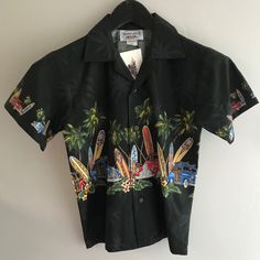 This Nice Black Shirt Is Very Beachy. Black Hawaiian Printed T-shirt, Black Button-up Camp Shirt For Beach, Black Button-up Beach Top, Black Button-up Camp Shirt For The Beach, Black Relaxed Fit Camp Shirt For Vacation, Black Hawaiian Shirt For Summer, Black Button-up Hawaiian Shirt For Beach, Fitted Button-up Hawaiian Shirt For Vacation, Black Camp Collar Shirt For Beach