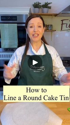 a woman standing in front of a counter with a cake on it and the words how to line a round cake tin