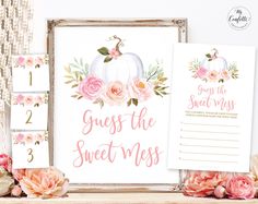 some pink flowers and white pumpkins are next to a sign that says guess the sweet mess