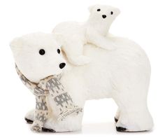 two white polar bears are standing next to each other with their arms around one another