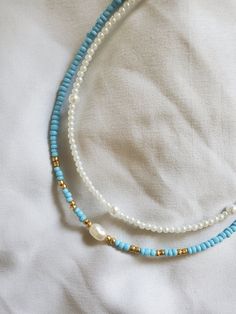 handmade w cultured freshwater pearls coastal granddaughter vibes Beach Pearl Beaded Necklaces With Spacer Beads, Pearl Beaded Necklaces With Spacer Beads For Beach, Pearl Necklaces With Spacer Beads For Beach, Bohemian Pearl Beaded Necklaces With Spacer Beads, Round Pearl Bead Jewelry For Vacation, Handmade Turquoise Pearl Necklace For Beach, Beach Pearl Beaded Jewelry, Vacation Beaded Pearl Necklace, Turquoise Beaded Necklace With Pearl Charm As Gift