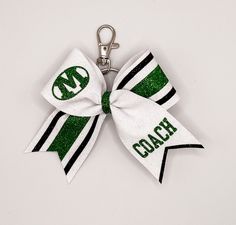 Mini Glitter Cheer Bow Keychain 🎀 Made with 1.5" grosgrain ribbon 🎀 Covered in glitter heat transfer vinyl 🎀 Can be made to match team bows with simple logos 🎀 5" x 4" Cheer Bow Keychain, Bow Keychain, Simple Logos, Pto Ideas, Glitter Cheer Bow, Glitter Heat Transfer Vinyl, Cheerleading Gifts, Senior Gifts, Cheer Dance