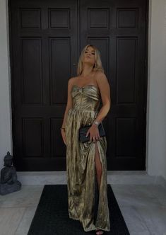 Gold Metallic Strapless Dress with Boning Model is wearing size S Gold Sleeveless Maxi Dress For Gala, Gold Dresses For Prom Season, Gold Maxi Dress For Night Out, Chic Gold Gown For Gala, Chic Gold Maxi Length Evening Dress, Glamorous Gold Dress For Prom Season, Glamorous Gold Dress For Prom, Gold Long Dress For Prom, Chic Gold Dress For Gala