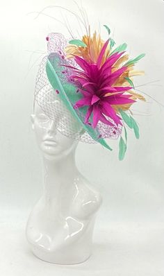 Handmade by Featured Milliner of The Kentucky Derby Museum 2023 & 2024! Light turquoise, teardrop base with giant magenta, feather mount, beige, feather accents, and coordinating magenta, dotted birdcage veil. vintage mod.  gorgeous detail  Attaches with headband.  Not taking customs this year--Derby 150 is going to be massive and mom life keeps me running! However, happy to suggest pieces that will coordinate with your outfit. If you don't love the way this attaches to your head--message me!  I Diy Kentucky Derby Hat, Kentucky Derby Party Hats, Head Message, Art Hats, Clip Headband, Kentucky Derby Fascinator, Derby Fascinator, Kentucky Derby Party, Birdcage Veil