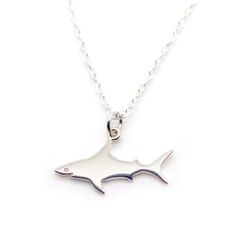 PRICES MAY VARY. Elegant Shark Pendant: This necklace features a stylish alloy shark pendant, showcasing a sleek and modern design that complements any outfit. Durable Material: Crafted from high-quality alloy, this necklace is resistant to tarnishing and suitable for everyday wear. Lightweight and Comfortable: Weighing just 0.08oz, this necklace offers lightweight comfort, making it ideal for all-day wear without feeling heavy. Adjustable Length: The chain measures 17.7 inches (45cm) in length, Shark Jewelry, Shark Pendant, Shark Necklace, Rose Clothing, Animal Necklace, Sea Animal, Pet Necklace, Jewelry Design Necklace, Ocean Animals