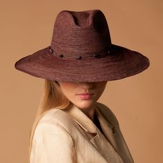 Our classic panama with a 4 inch brim, featuring a tagua nut bead band and made with a crochet weave for easy packing and storing. • Handcrafted in Ecuador by Artisans • Made with 100% Natural Toquilla Straw & Tagua Nut Beads • Brim Size: 4” • Size-Adjustable Inner Band Elegant Handmade Panama Hat With Curved Brim, Adjustable Brown Woven Fedora, Brown Woven Brimmed Panama Hat, Handmade Brown Panama Hat With Curved Brim, Brown Woven Fedora For Travel, Artisan Brown Flat Brim Panama Hat, Artisan Brown Panama Hat With Flat Brim, Handmade Brown Brimmed Panama Hat, Brown Woven Panama Hat For Travel