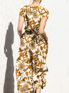 Plant Print Elastic Waist Pocket Short Sleeve Casual Jumpsuit Short Sleeve Jumpsuits And Rompers With Pockets For Beach, Casual Printed V-neck Jumpsuits And Rompers, Casual Short Sleeve Jumpsuits And Rompers For Vacation, Casual Brown V-neck Jumpsuits And Rompers, Brown Jumpsuits And Rompers With Pockets For Spring, Fall Jumpsuits And Rompers With Pockets And Short Sleeve, Casual Floral Print Jumpsuit For Day Out, Brown Short Sleeve Jumpsuits And Rompers For Spring, Casual Printed Jumpsuits And Rompers For Fall