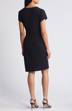 A bold asymmetric neckline lends modern detail to a sophisticated sheath dress made with comfortable stretch. 39" length Hidden back-zip closure Asymmetric neck Short sleeves Partially lined 96% polyester, 4% spandex Machine wash, tumble dry Imported Elastane Midi Dress With Back Zipper, Sleek Fitted Dress With Asymmetrical Neckline, Elegant Elastane Bodycon Dress For Work, Flattering Elastane Bodycon Dress For Work, Elegant Bodycon Dress For Work, Classic Dresses With Asymmetrical Neckline, Formal Fitted Bodycon Dress With Asymmetrical Neckline, Sheath Midi Dress For Work, Office Bodycon Dress Made Of Elastane