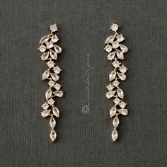 two pairs of gold and crystal earrings