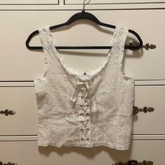 Purchased From Korean Brand Stylenanda, Nwot. Unlined. No Tag, One-Size But A But Close To A Small, See Measurements In Pics. Korean Broderie Anglais Embroidered Lace Corset Coquette Summer Lana Del Rey Top Milkmaid Cottagecore Cottage Core White Sleeveless Eyelet Top, White Sleeveless Top With Eyelet Details, Sleeveless Lace Tops With Broderie Anglaise, Lana Del Rey Top, Cottagecore Tops, Coquette Summer, Cottagecore Cottage, Korean Brand, Korean Brands