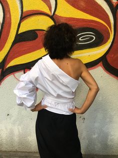 "An amazing and extravagant womens white blouse. Perfect for all, looks great with any outfit. Made from fine cotton fabric. SIZE CHART SIZE S - US 6, UK 8, EU 36 bust: bust around 34.5\"/90cm Waist: waist around 27.5\"/70cm Hips: hips around 34.5\"/90cm SIZE M - US 8, UK 10, EU 38 bust: bust around 37.5\"/95cm Waist: waist around 29.5\"/75cm Hips: hips around 37.5\"/95cm SIZE L - US 10, UK 12, EU 40 bust: bust around 39.5\"/100cm Waist: waist around 31.5\"/80cm Hips: hips around 39.5\"/100cm SI Womens White Blouse, Women White Blouse, Black Minimalist, White Blouse, Wrap Top, Off Shoulder Blouse, Bulgaria, One Shoulder Blouse, Blouses For Women