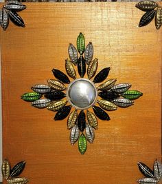 a wooden box with metal decorations on it