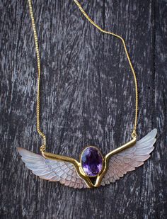 The Amethyst Mabeshell Wings Necklace features a deep purple amethyst gemstone to promote calmness, balance, and clarity of mind. The iridescent mabeshell wings add a mystical quality to this necklace, symbolizing protection, transformation, and connection to the divine. Made with pure intentions and infused with blessings, the necklace elevates your spirit from sacred ceremonies to everyday wear. Choose from silver or gold-plated silver - Blessed by a Balinese priest in ceremony with the moon, Pure Intentions, Wings Necklace, Wing Necklace, Balinese, The Divine, Unique Outfits, Amethyst Gemstone, Gold Plated Silver, Purple Amethyst