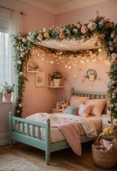 a bedroom decorated with flowers and string lights