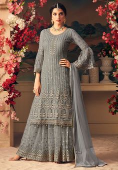 Net Pakistani Suit in Grey This Semi-stitched Attire with Poly Shantoon Lining is Beautified with Resham, Sequins and Patch Border Work. Crafted in Round Neck and Bell Sleeves Available with a Net (Lining : Poly Shantoon) Palazzo in Grey and a Net Dupatta in Grey The Kameez and Bottom Length are 42 inches respectively Do note: Accessories shown in the image are for presentation purpose only and length may vary upto 2 inches.(Slight variation in actual color vs. image is possible). Designer Suits Online, Abaya Style, Mode Abaya