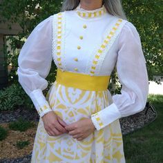 "Bright yellow and white 1970's maxi dress. Cotton blend weave, sheer but lined everywhere except the sleeves. Wide grosgrain ribbon trim at the waist. Back zip closure. So beautiful! Fits a S, please compare the measurements below with a dress you have at home that fits well. No stretch. Excellent condition overall, the last picture shows tiny spots I found on the skirt, no one else will notice! Shoulders: 14.25\" Sleeves: 24.5\" Bust: 35\" Waist: 27\" Hip: 40\" (taken on the lining, the top la 1970s Style White Maxi Dress, Retro White Maxi Dress For Spring, 1970s White Maxi Dress, 1970s White Maxi Length Dresses, 1970s Style White Vintage Dress For Spring, White Fitted Retro Maxi Dress, 1960s Prom, The Last Picture Show, Butterfly Dress