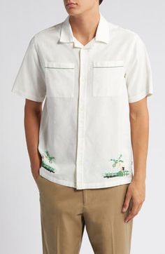 Palm-themed cross-stitching lends an artisanal touch to a festival-ready camp shirt cut from a breathable blend of cotton and linen. 28" length; 43" chest (size Medium) Front button closure Convertible collar Short sleeves Chest patch pockets 84% cotton, 16% linen Machine wash, line dry Imported Embroidered Camp Shirt With Relaxed Fit For Vacation, Embroidered Camp Collar Shirt For Vacation, Casual Embroidered Top With Camp Collar, Embroidered Camp Shirt With Camp Collar For Vacation, Spring Vacation Embroidered Camp Shirt, Embroidered Relaxed Fit Camp Shirt, Embroidered Relaxed Fit Casual Camp Shirt, Embroidered Casual Camp Shirt With Relaxed Fit, Casual Embroidered Camp Shirt With Relaxed Fit