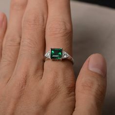 This is a gorgeous handmade creation. Its beauty is its simplicity & Elegance. The 7*7 mm square shape faceted lab emerald is crafted in solid sterling silver and with rhodium plated. All item is sent in a beautiful gift box If you have any idea of design your ring,pls contact me directly. You can realize more lovely stuff clicking the link https://www.etsy.com/shop/knightjewelry?refshopsection_shophome_leftnav Please leave the correct address and you phone number for delivering successfully Classic Princess Cut Emerald Jewelry, Anniversary Emerald Ring With Bezel Setting, Fine Jewelry Emerald Ring With Square Cut For Promise, Rectangular Sterling Silver Emerald Ring For Wedding, Fine Jewelry Emerald Square Cut Promise Ring, Rectangular Emerald Ring In Sterling Silver For Wedding, Silver Emerald Ring Princess Cut, Elegant Sterling Silver Princess Cut Emerald Ring, Square Cut Emerald Jewelry With Accent Stones