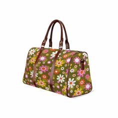 Bring a hippie-dippy style to all your journeys with this Groovy Hippie Daisy Flower Power Travel Bag. Crafted from water-resistant fabric with brown PU leather handles and an adjustable shoulder strap, it will keep your belongings safe and secure on all your trips – no matter how far out they are! Key Features One size: 20" × 12'' × 9" (50.8cm × 30.5cm × 23cm ) 100% high-grade microfiber PU leather: Microfiber leather is a type of synthetic leather, made from a combination of microfiber non-wov Casual Travel Bag With Floral Print, Casual Floral Print Travel Bag, Casual Bags For Weekend Trips In Spring, Casual Spring Bags For Weekend Trips, Green Floral Print Travel Bag, Everyday Brown Shoulder Bag With Floral Print, Bohemian Brown Bags For Weekend Trips, Brown Canvas Travel Bag For Trips, Retro Spring Travel Bag