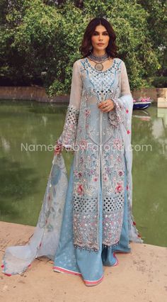 Party Wear Pakistani Dress in Sky Blue Shade Online Glamorous Eid Dress With Dupatta, Glamorous Dress With Dupatta For Eid, Blue Embellished Dresses For Eid, Glamorous Organza Dresses For Eid, Light Blue Reception Dress With Resham Embroidery, Light Blue Dress With Resham Embroidery For Reception, Blue Organza Dress For Wedding Guest, Glamorous Blue Wedding Dress, Blue Organza Embellished Dress