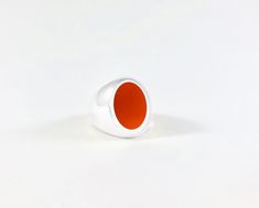 Legier Carnelian Oval Stone Signet Ring Oval Enamel Ring With Polished Finish As Gift, Modern Orange Oval Rings, Modernist Oval Signet Ring As Gift, Modernist Oval Signet Ring For Gift, Orange Oval Ring With Polished Finish, Oval Orange Ring With Polished Finish, Silver Oval Carnelian Signet Ring, Handmade Modern Oval Signet Ring, Modern Handmade Oval Signet Ring