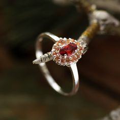 Beautifully marrying a little vintage inspiration with a boho chic edge, meet our sterling silver Rosmerta Ring. Featuring a blood red cubic zirconia centre surrounded by dainty peach stones and set into a delicate band, she is a true Dixi enchantress. This ring is named after the celtic Goddess Rosmerta; known as 'The Great Provider', she invokes fertility and wealth. MaterialSterling SilverCubic Zirconia SizingRing Sizes Available - 15.75mm [USA 5], 16.25mm [USA 6], 17.25mm [USA 7], 18.25mm [U Celtic Goddess, Precious Stones Rings, Red Peach, Witchy Jewelry, Red Boho, Jewelry Website, Vintage Inspiration, Cubic Zirconia Rings, Moon Necklace